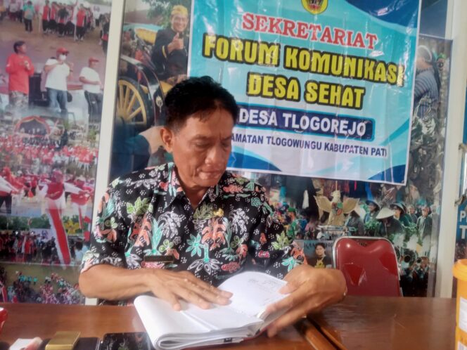 
					<em>Kepala Desa Tlogorejo, Suharno - (Image courtesy: infojateng.id)</em>
