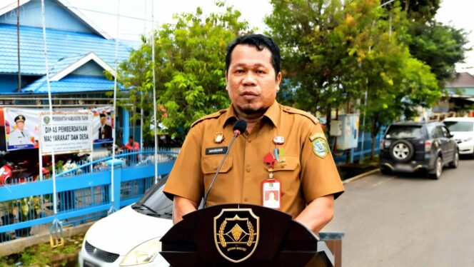 
					Kepala DPMD Kabupaten Tapin, Rahmadi